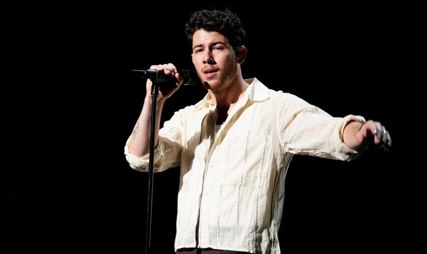 Nick Jonas runs off Prague concert stage after laser is pointed directly at him