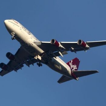 'Drunk' Virgin Atlantic passenger threatened air hostess with 'violence' on horror flight