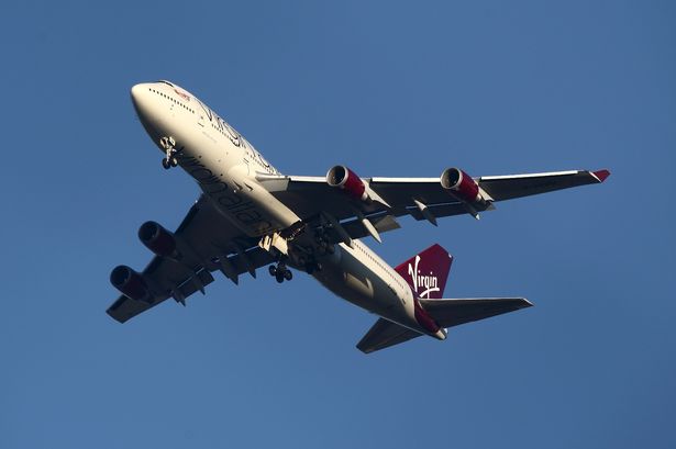 'Drunk' Virgin Atlantic passenger threatened air hostess with 'violence' on horror flight