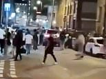 Horrifying moment car ploughs into crowd during brawl outside Freshers' Night club event that left six injured