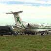 Alex Salmond's body returns home to Scotland on private flight