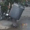 Video captures water tank falling on woman — but she miraculously escapes injury