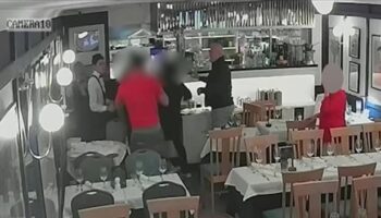 Moment couple 'attack restaurant staff in fight over dine and dash claims'