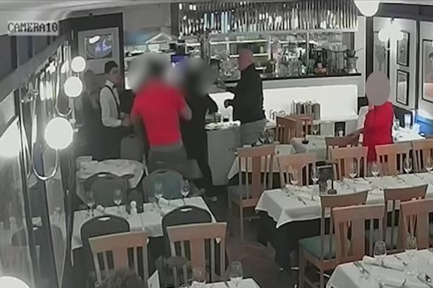 Moment couple 'attack restaurant staff in fight over dine and dash claims'