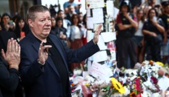 Geoff Payne, father of former One Direction band member Liam Payne, who was found dead after he fell from a third-floor hotel room balcony, waves to people outside the hotel where Liam Payne was found dead, in Buenos Aires, Argentina October 18, 2024. REUTERS/Tomas Cuesta