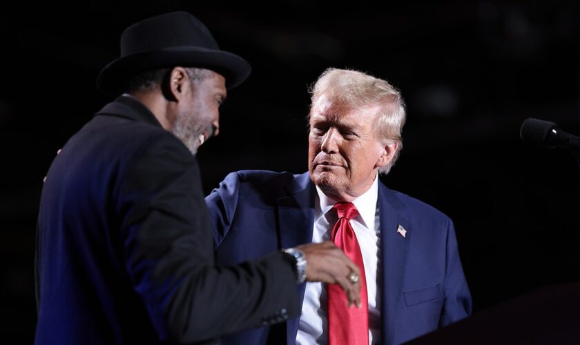 Boxing Hall of Famer Thomas 'Hitman' Hearns joins Trump on stage at Detroit rally: 'This can't be real'