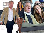 Hugh Grant, 64, packs on PDA with leggy wife Anna Eberstein, 41, as couple attends football match at Sinigaglia Stadium in Italy