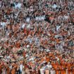 Texas fans launch beer cans, other debris onto field after questionable call