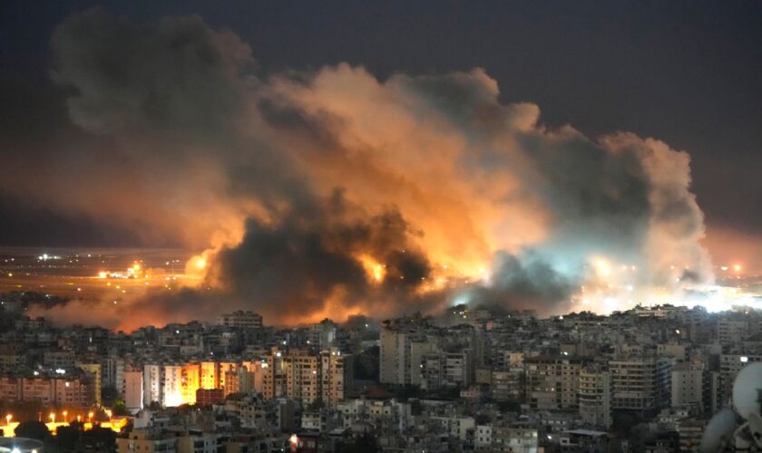 Flames and smoke rise form Israeli airstrikes on Dahiyeh, in the southern suburb of Beirut, Lebanon, Sunday, Oct. 20, 2024. (AP Photo/Hussein Malla)