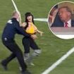 Woman runs onto field waving pro-Trump sign during Jets-Steelers game - as former president watches on from the stands