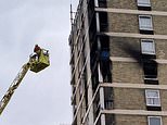 Huge fire at block of flats in East London as ten fire engines and 70 firefighters race to scene