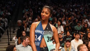 Angel Reese sits courtside at WNBA Finals with split Lynx/Liberty outfit