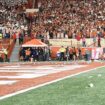 Texas fined $250,000 for fans throwing debris on field, 'required' to find those who did so