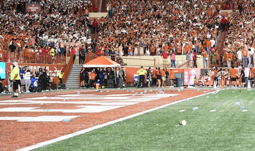 Texas fined $250,000 for fans throwing debris on field, 'required' to find those who did so