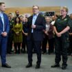 Prime Minister Sir Keir Starmer (centre) and Health Secretary Wes Streeting, with chief paramedic at London Ambulance Service Pauline Cranmer, meet NHS staff during a visit in east London. Picture date: Monday October 21, 2024.