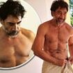 Javier Bardem, 55, shows off his shirtless physique in snaps taken by his wife Penelope Cruz as he reflects on rekindling their romance 17 YEARS after they first met