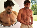 Javier Bardem, 55, shows off his shirtless physique in snaps taken by his wife Penelope Cruz as he reflects on rekindling their romance 17 YEARS after they first met