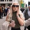 OnlyFans model who milkshaked Farage makes subtle political gesture as she arrives at court and plugs her porn career