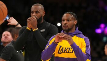 LeBron, Bronny James make history as first father-son duo to play in NBA game together in Lakers home opener