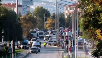 Emergency teams and police outside Turkish Aerospace in Ankara. Pic: AP