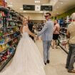 Food and marriage? Newlyweds snap wedding pix in grocery-store aisle