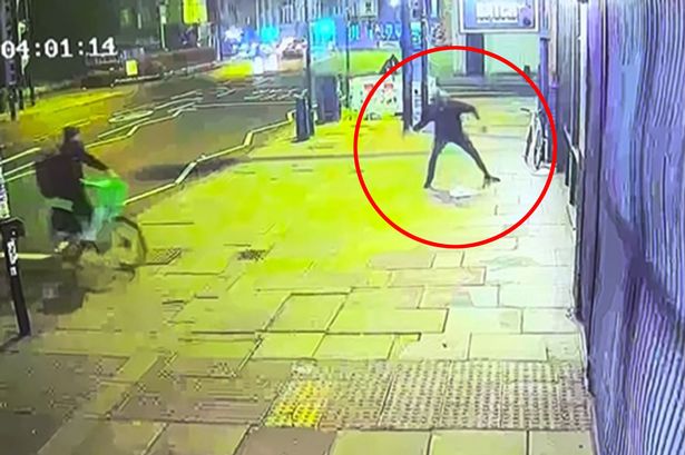 Moment brick-wielding thieves smash suit shop window and take off on bikes with £6,000 in loot