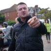 Tommy Robinson charged after handing himself in at police station