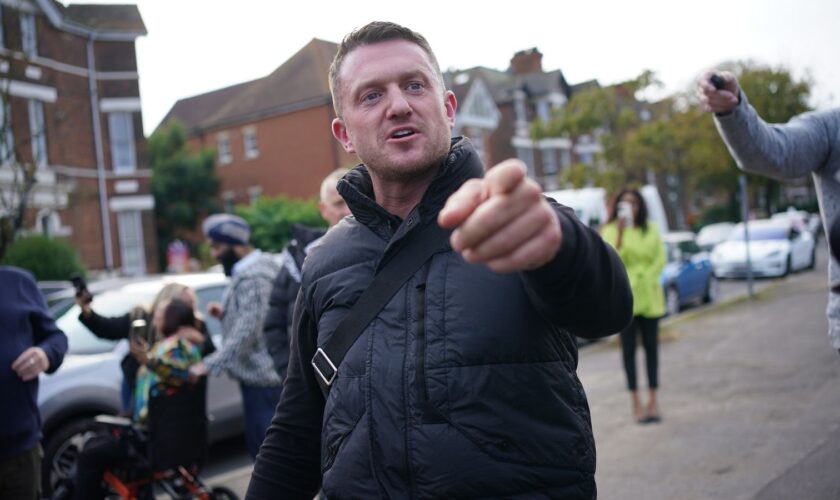 Tommy Robinson charged after handing himself in at police station