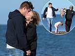 Tom Parker's widow Kelsey shares a romantic kiss on the beach with boyfriend Will Lindsay during a family holiday - two years after The Wanted star's death