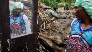 At least 126 dead and missing in massive flooding and landslides in Philippines