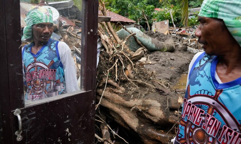 At least 126 dead and missing in massive flooding and landslides in Philippines