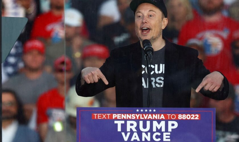 Elon Musk speaking at an event which was the site of the July assassination attempt against Trump. Pic: Carlos Barria/Reuters