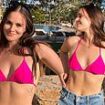 Newly-engaged Holly Ramsay looks incredible as she displays her toned abs in a pink bikini while soaking up the sun in Greece