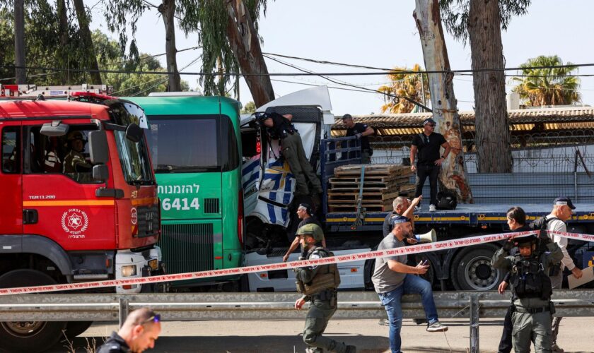 One killed after truck rams bus stop near Tel Aviv - as Iranian leader responds to Israeli strikes