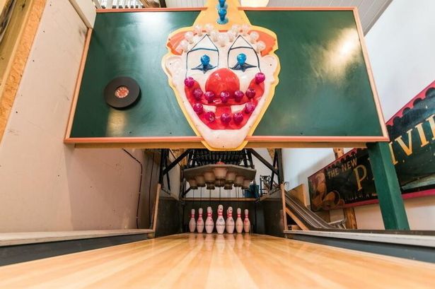 Incredible fairground themed home with bowling alley and cinema on sale for jaw-dropping price