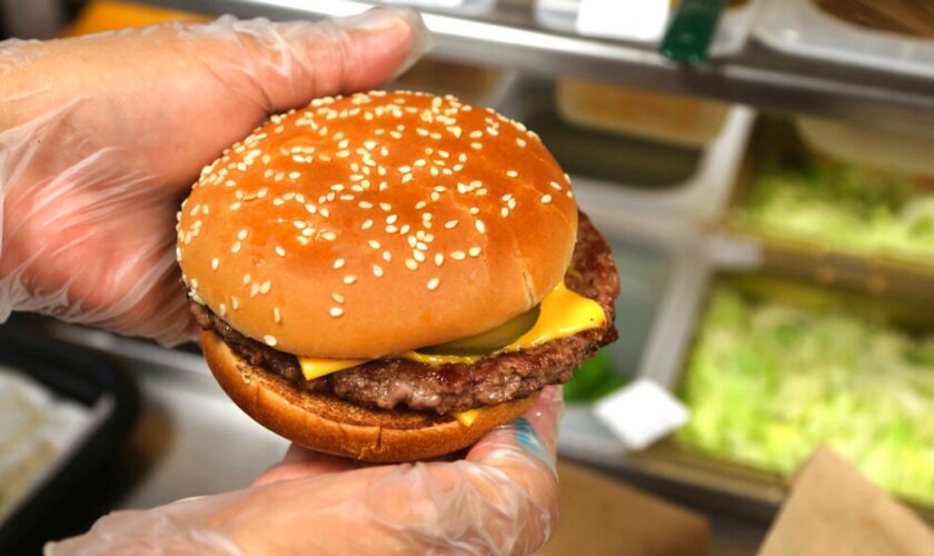 McDonald's Quarter Pounder burger with cheese is now made with fresh beef and made to order. (Scott Keeler/The Tampa Bay Times via AP)