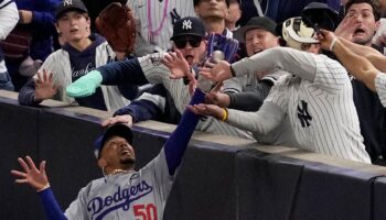 Yankees fans try to rip glove off Mookie Betts' hand, pry ball out