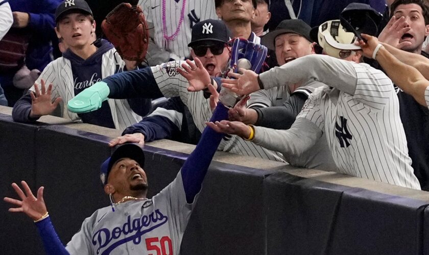 Yankees fans try to rip glove off Mookie Betts' hand, pry ball out