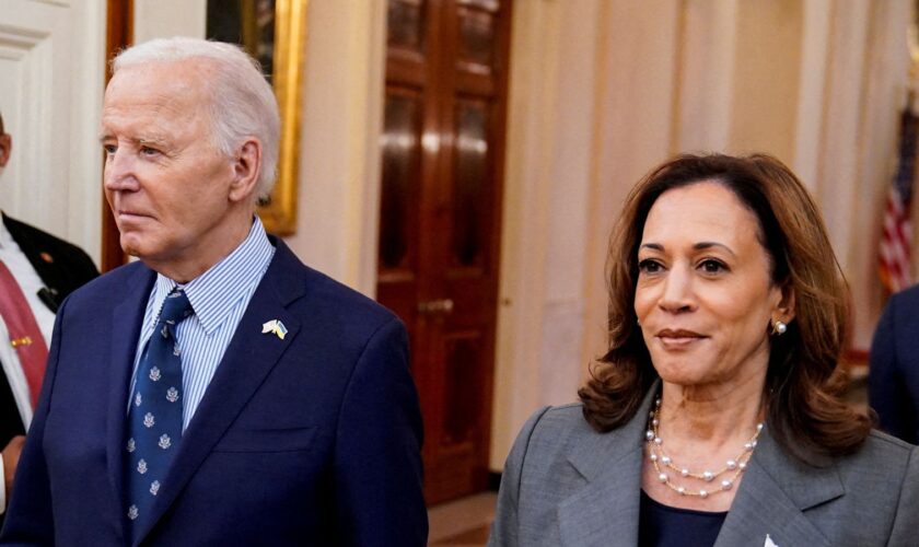 U.S. President Joe Biden and Democratic presidential nominee Vice President Kamala Harris walk to deliver remarks on gun violence in America, at the White House in Washington, U.S., September 26, 2024. REUTERS/Elizabeth Frantz