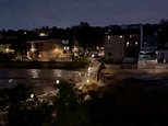 Terrifying moment a bridge is swept away by Valencia floods as new videos show how one of Spain's worst-ever natural disasters has claimed more than 60 lives and devastated entire suburbs