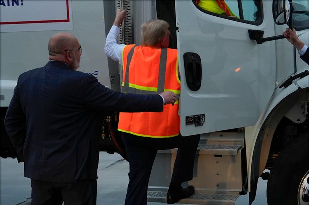 Donald Trump nearly falls over and misses truck door handle twice in worrying display of decline