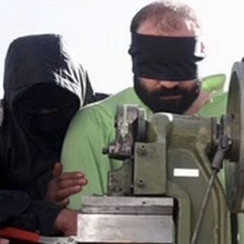 Iran amputates four fingers of two thieves with guillotine machine in rare Sharia law punishment