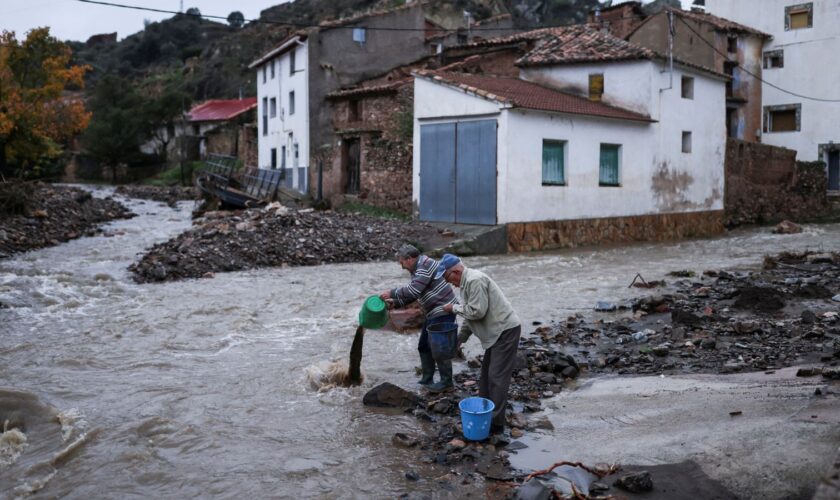 Worst floods in Spain's memory hit 'like a tsunami'