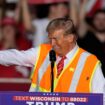 Donald Trump wears garbage worker vest to rally in critical swing state