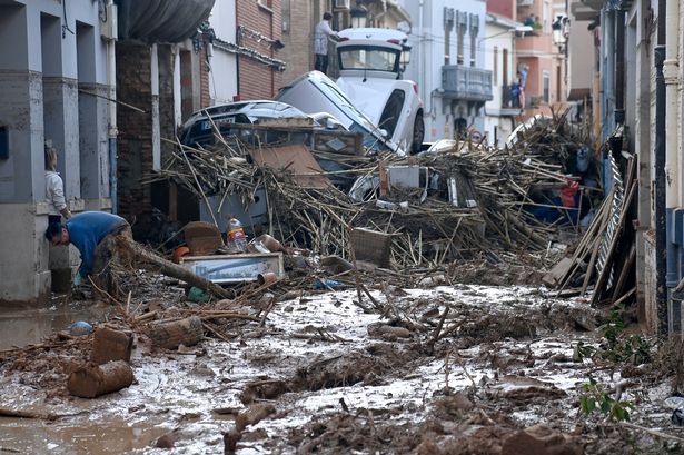 Spanish floods' rising misery as death toll climbs to 158 amid search for more bodies