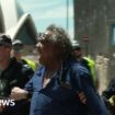 Aboriginal protester arrested during King's Sydney tour