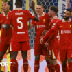 Liverpool's players celebrate after scoring against RB Leipzig in the Champions League