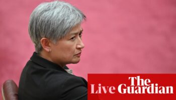 Australia news live: Sydney beach closed after mysterious black balls wash ashore; Penny Wong launches humanitarian policy