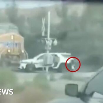 Children saved from car stuck in path of oncoming train