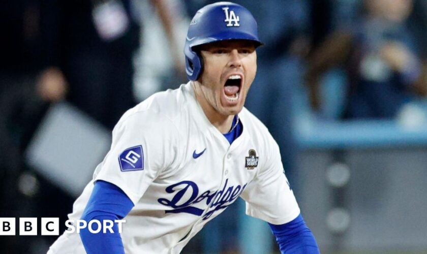 Los Angeles Dodgers first baseman Freddie Freeman celebrates after hitting a walk-off grand slam to win game one of the World Series